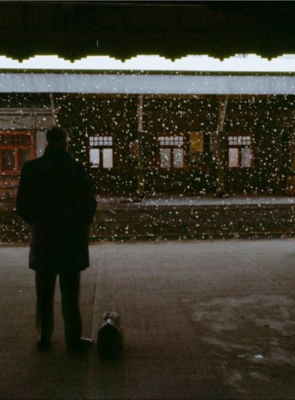 man on a train station quay