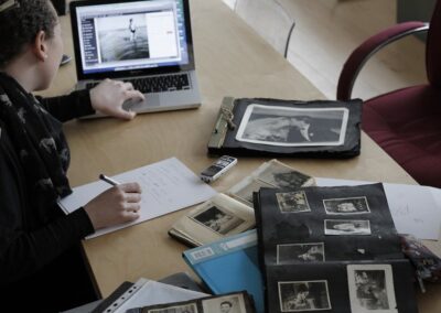 someone working on old photobook