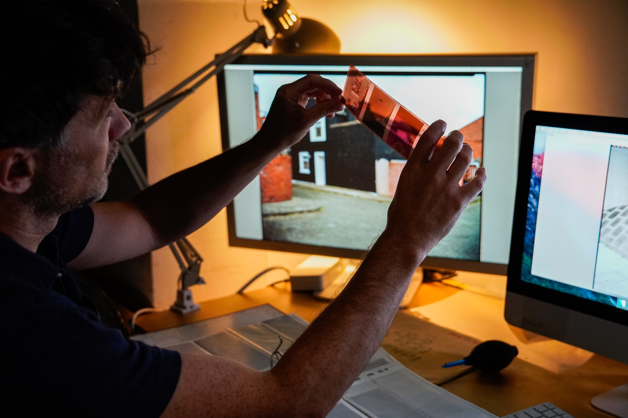 Exhitbition Development Resident Artist Shane Lynam works with the high-spec Hasselblad scanner in Photo Museum Ireland's Artists' Digital Suite