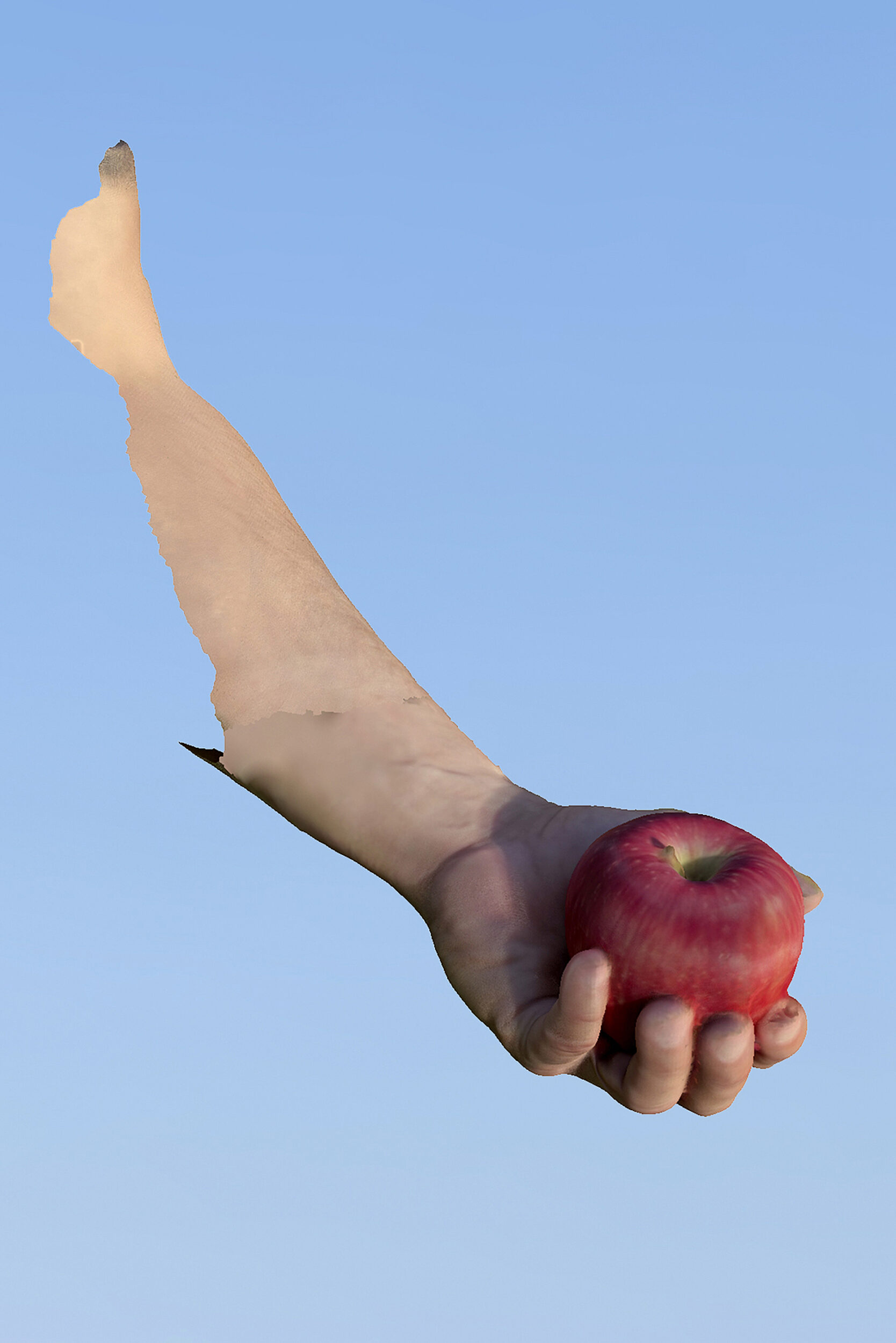 A digital image of a hand holding a red apple against and artificial blue background.
