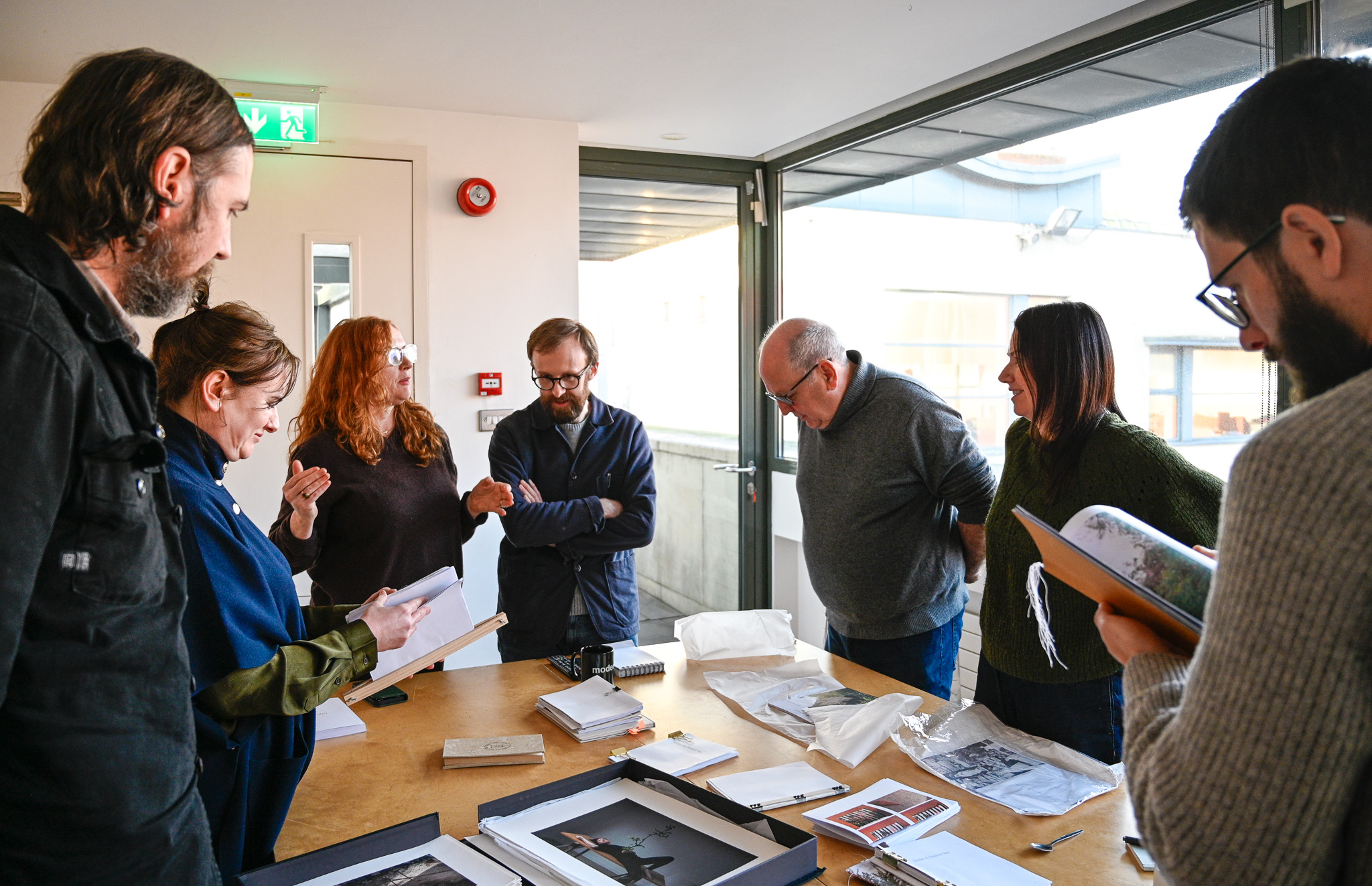 Artist Residency Photobook Session at Photo Museum Ireland © Photo Museum Ireland 001 Resident Artists, Staff, and Board Members assembled in the gallery of Photo Museum Ireland at the launch of Photo Museum Ireland's Stategic Plan Launch
